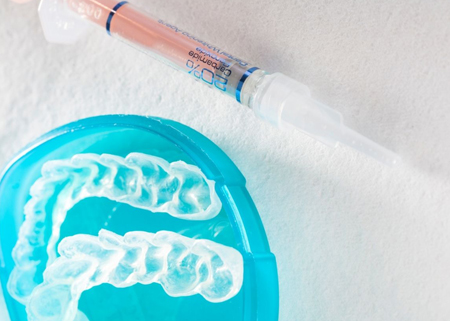 Teeth whitening trays and gel tube